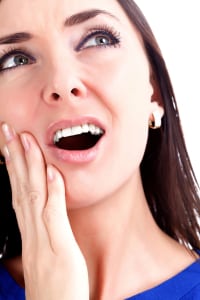 woman worried about toothache