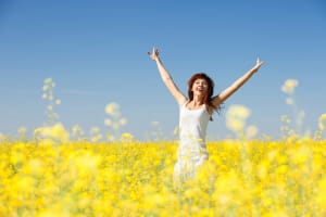 woman happy about headache relief from dentist